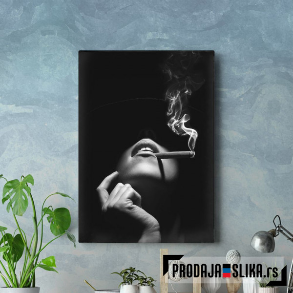 Woman smoking a cigar Woman smoking a cigar